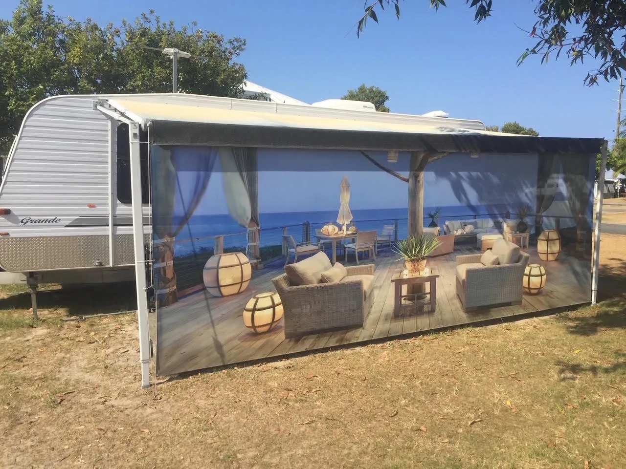 Custom privacy screen fitted to a caravan awning